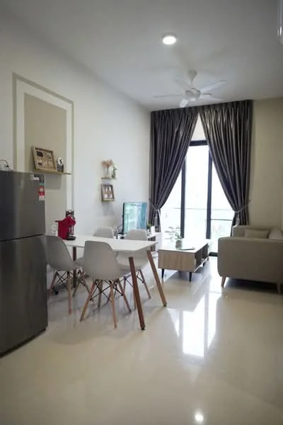 Living features: 3-seater fabric sofa in light grey, white dining table with wooden legs, 4 white plastic dining chairs, stainless-steel fridge, flat-screen TV, TV console in light wood, large floor-to-ceiling windows, grey curtains, ceiling fan with light, polished tile flooring, decorative wall panel, wall-mounted photo frames, indoor plants; style: modern; view: city.