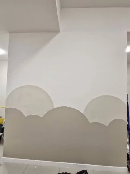 Room features: white painted walls, decorative wall design with curved shapes, light grey painted lower section, glossy tile flooring; style: modern.