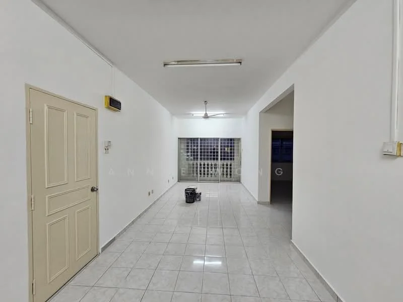 Room features: white painted walls, grey tiled flooring, ceiling lights, 1 ceiling fan, large window with grille, door leading to another room, empty space, bucket on the floor; style: minimalist.
