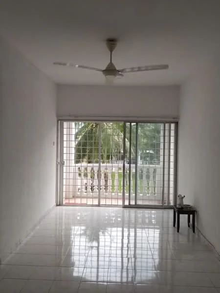 Room features: white painted walls, glossy tile flooring, 5-blade ceiling fan, floor-to-ceiling sliding glass door, balcony with railing, natural light from balcony, view of greenery outside, small side table; view: garden.