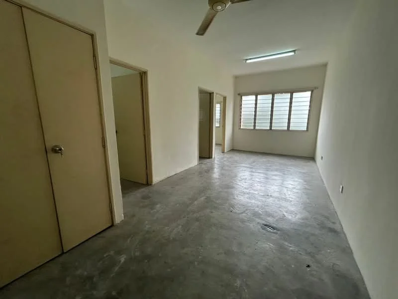 Room features: plain white walls, concrete flooring, ceiling fan, window with horizontal slats, two doors leading to other rooms, fluorescent ceiling light; style: minimalist.