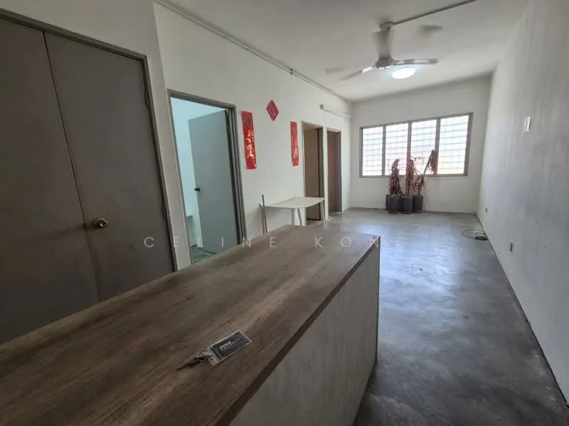 Room features: grey concrete flooring, white painted walls, ceiling fan, large window with grid pattern, wooden door, table with minimalist design, decorative wall art, potted plants; style: minimalist.