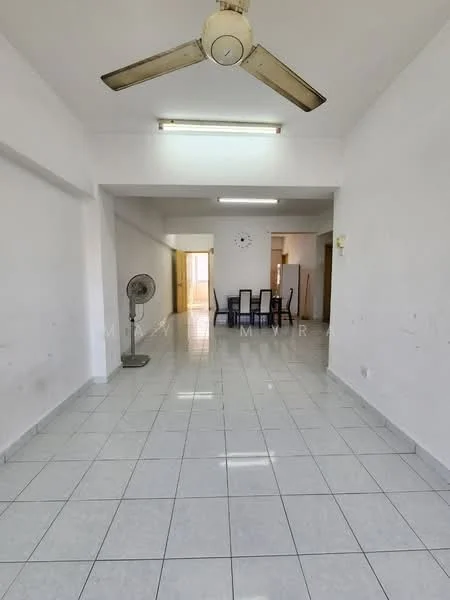 Living features: white painted walls, ceramic tile flooring, 5-blade ceiling fan, wall-mounted clock, large windows for natural light, dining table with chairs, standing fan, open layout.