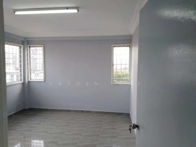Room features: light grey painted walls, glossy grey tile flooring, two windows with metal grilles, ceiling light fixture, corner room, no visible furniture; style: modern; view: city.
