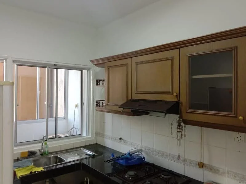 Kitchen features: wooden cabinetry with glass-front upper cabinets, black granite countertop, stainless-steel sink, 4-burner gas hob, exhaust hood, white tiled backsplash, window with view to outside, wall-mounted storage, hanging utensils, tile flooring; style: modern.