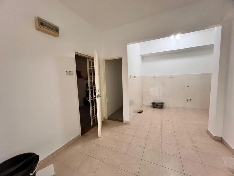 Room features: cream tiled flooring, white painted walls, wall-mounted air conditioning unit, doorway leading to another room, empty wall space, light fixtures on ceiling, plumbing fixtures visible on wall, tile cladding on lower wall.