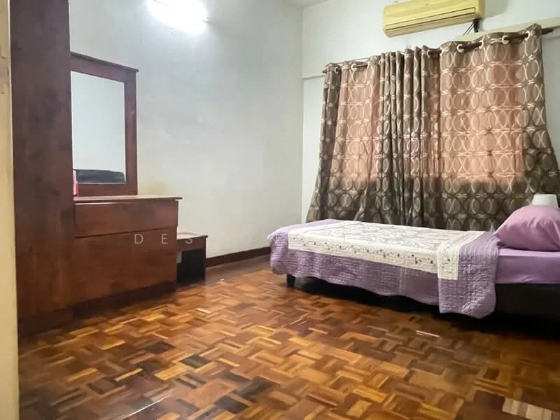 Bedroom features: wooden flooring, purple bedspread, single bed, upholstered headboard, wooden dresser with mirror, curtains with geometric pattern, wall-mounted air conditioning unit, decorative wall light.
