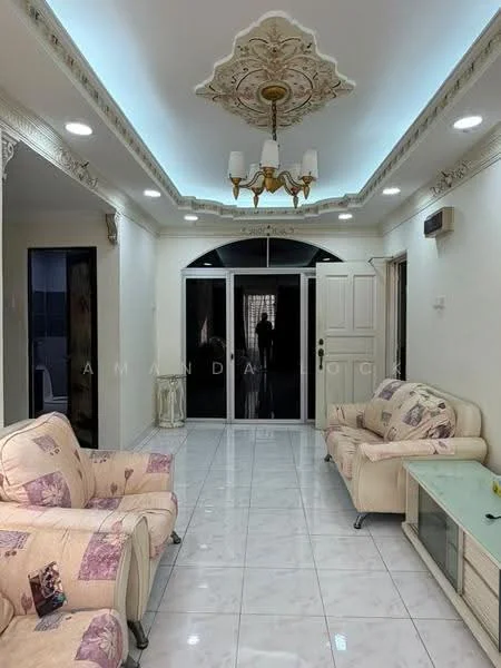 Living features: white painted walls, glossy white tile flooring, chandelier with multiple bulbs, recessed downlights, sliding glass door, cream-colored 3-seater sofa, cream-colored 2-seater sofa, decorative ceiling with intricate design, wall-mounted air conditioning unit, glass coffee table; style: modern.