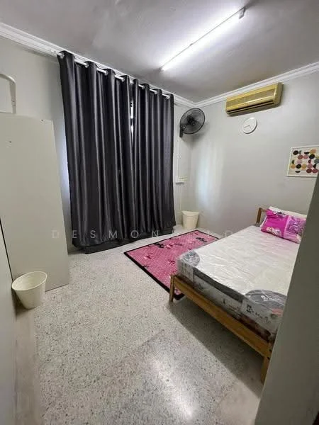 Bedroom features: single bed, upholstered headboard, pink bedspread, grey curtains, wall-mounted ceiling fan, air conditioning unit, decorative wall art, white walls, polished concrete flooring, small waste bin; style: minimalist.