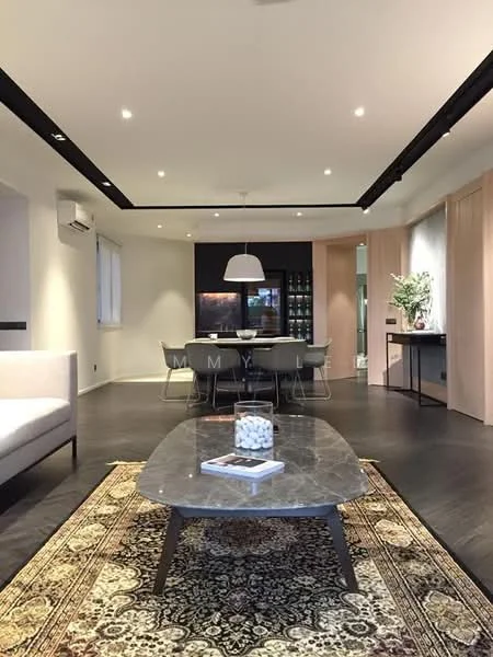 Living features: dark hardwood flooring, white painted walls, recessed downlights, 5-blade ceiling fan, large pendant light, sofa in light fabric, coffee table with marble top, decorative area rug with intricate pattern, dining table with upholstered chairs, built-in cabinetry with glass doors, air conditioning unit, floor-to-ceiling windows with sheer curtains; style: modern.