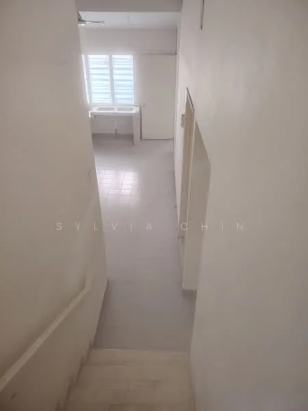 Room features: white painted walls, grey tiled flooring, window with horizontal slats, staircase with handrail, utility area with sink, bright lighting, open space layout; style: minimalist.