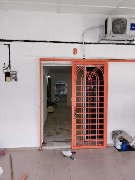 Room features: orange security grille door, white painted walls, ceiling-mounted air conditioning unit, tiled flooring, light fixture visible in background, open doorway leading to another room.