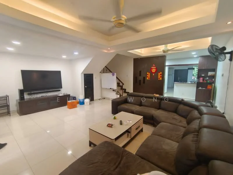Living features: L-shape sectional sofa in brown, coffee table, wall-mounted TV, TV console, recessed downlights, ceiling fan, white painted walls, cream tiled flooring, open layout, staircase in background, decorative wall panel, area rug; style: modern.