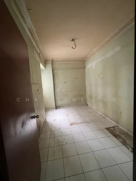 Room features: unpainted walls with peeling paint, white tiled flooring, ceiling with exposed light fixture, no visible windows, empty space, corner with wall damage, no furniture, minimal decor.