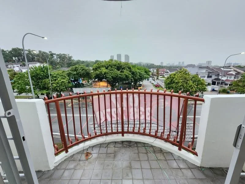 Room features: curved balcony, metal railing, grey tiled flooring, outdoor view, surrounding greenery, city skyline in background, street view, overcast sky; view: city.