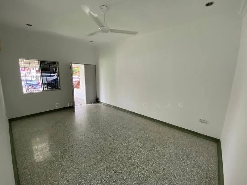 Room features: white painted walls, grey terrazzo flooring, ceiling fan, window with security bars, single door, light fixtures, no visible furniture; style: minimalist.