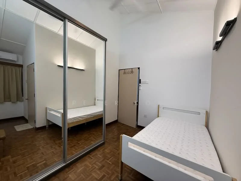 Bedroom features: two single beds, mirrored wardrobe, wooden flooring, white walls, ceiling fan, curtains, light fixture on ceiling, door with handle.