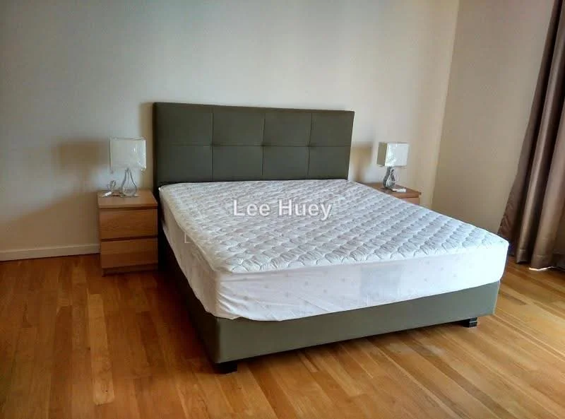 Bedroom features: king-size bed, upholstered headboard in green, two bedside tables, glass table lamps, wooden flooring, neutral wall color, curtains, mattress with white bedding; style: modern.
