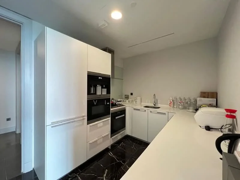 Kitchen features: white flat-panel cabinets, black marble countertop, built-in oven, built-in microwave, stainless-steel sink, chrome pull-down faucet, glass splashback, integrated refrigerator, ceramic tile flooring, recessed downlights; style: modern.