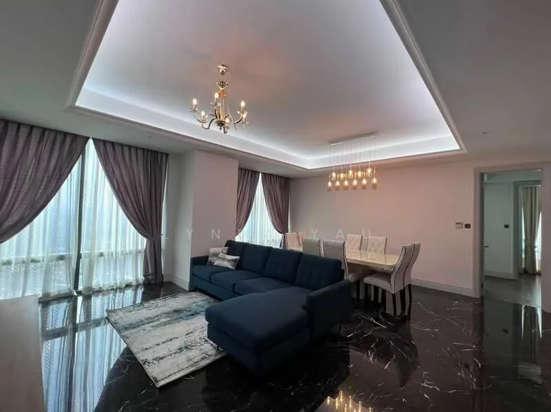 Living features: dark marble flooring, white painted walls, tray ceiling with recessed lighting, chandelier, 5-blade ceiling fan with light, floor-to-ceiling windows with sheer curtains, blue fabric sectional sofa, area rug with abstract pattern, dining table with upholstered chairs, decorative wall lighting; style: modern.