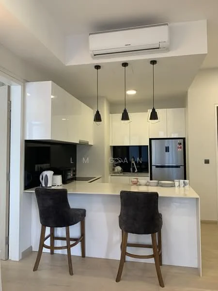 Kitchen features: white shaker cabinets, black countertop, stainless-steel fridge, built-in oven, 4-burner gas hob, black pendant lights, single-bowl stainless-steel sink, chrome pull-down faucet, white walls, wooden flooring, wall-mounted split AC, bar seating with two stools; style: modern.