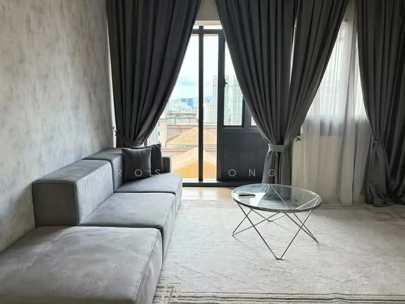 Living features: grey fabric sectional sofa, glass coffee table, floor-to-ceiling windows, sheer curtains, blackout curtains, light grey wallpaper, area rug with geometric pattern, city view; style: modern; view: city.