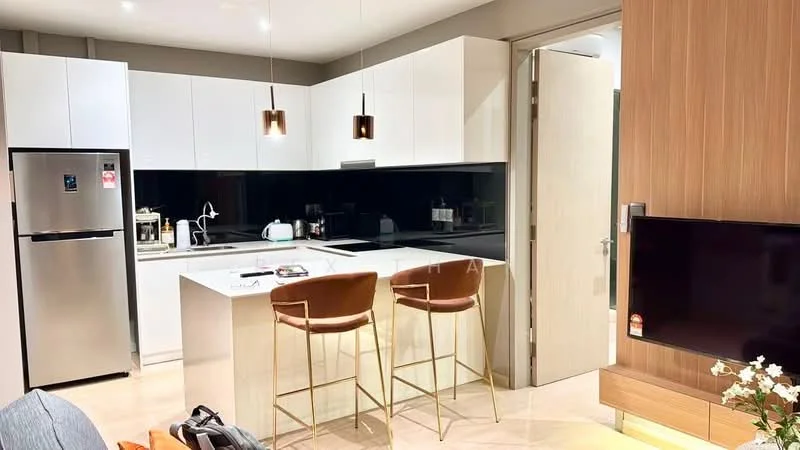 Kitchen features: white glossy cabinetry, black glass backsplash, island countertop with bar seating, stainless-steel fridge, built-in oven, 4-burner induction hob, chrome pull-down faucet, single-bowl stainless-steel sink, pendant lighting over island, recessed downlights, cream marble flooring, open layout to living area; style: modern.
