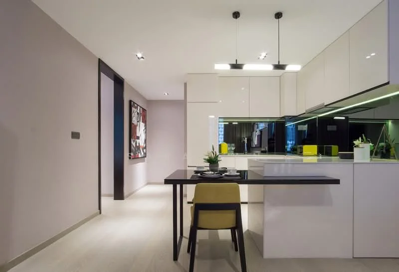 Kitchen features: white glossy cabinetry, black countertop, stainless-steel sink, chrome pull-down faucet, built-in oven, freestanding range oven, refrigerator, pendant lighting, open shelving, wall-mounted artwork, light wood flooring, greenery in pot, dining table with black surface, yellow kitchen accessories; style: modern.