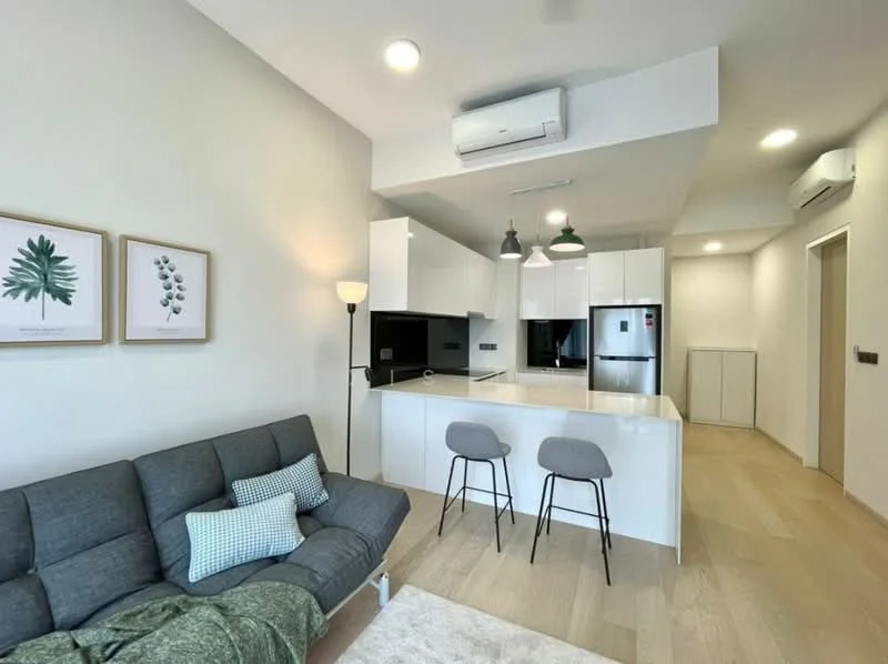 Living features: grey fabric sofa, 2 grey bar stools, white kitchen island, black kitchen cabinetry, stainless-steel fridge, built-in oven, recessed downlights, pendant lights over island, light wood flooring, air conditioning unit, decorative wall art with plant motifs; style: modern.