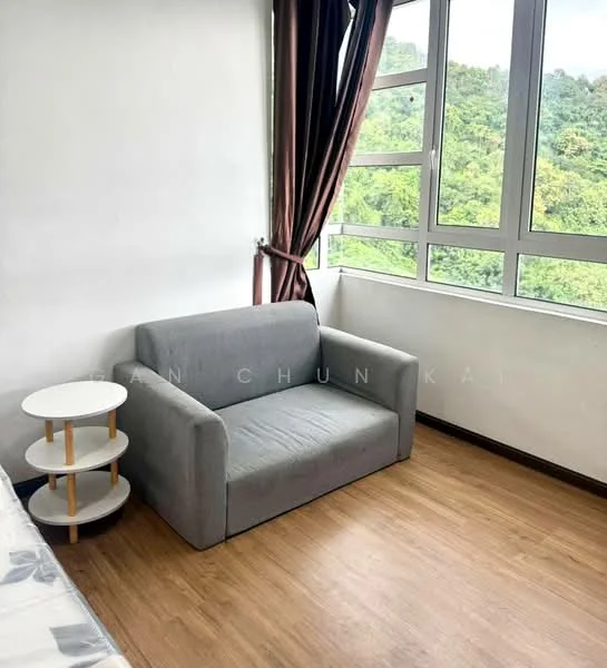 Living features: grey fabric sofa, round white side table, large windows with mountain view, brown laminate flooring, curtains in dark brown, white painted walls; style: modern; view: mountain.
