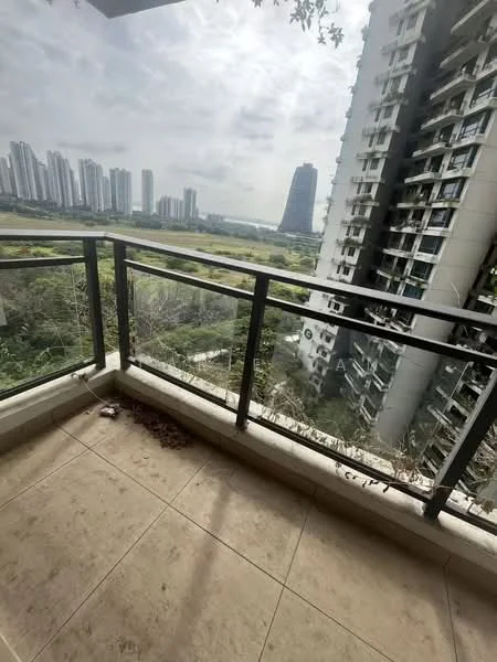 Room features: balcony, glass railing, tile flooring, city skyline view, concrete wall, overhead canopy, outdoor space, greenery in view; style: modern; view: city.