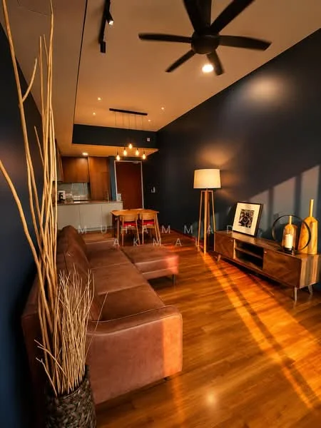 Living features: brown leather sofa, wooden coffee table, floor lamp, decorative vase with branches, wooden TV console, framed artwork, recessed downlights, 5-blade ceiling fan, dark blue accent wall, laminate wood flooring, open kitchen view, dining area visible; style: modern.