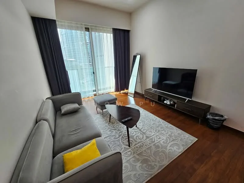 Living features: 3-seater fabric sofa in grey, yellow accent cushion, coffee table, TV console, wall-mounted TV, area rug with intricate pattern, floor-to-ceiling windows, curtains in dark blue, wooden flooring, full-length mirror, basket; style: modern; view: city.