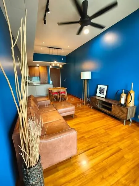 Living features: brown leather sofa, wooden coffee table, floor lamp, decorative vase with branches, blue painted walls, wooden flooring, ceiling fan with light, recessed downlights, open kitchen view, framed artwork on wall; style: modern.