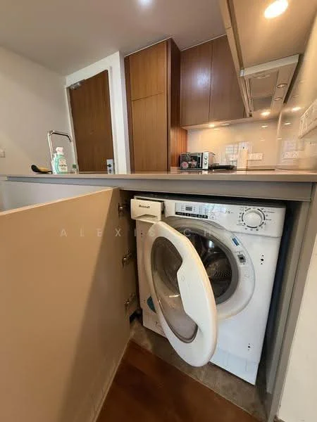 Laundry features: front-load washing machine, wood cabinetry, grey countertop, white walls, tile flooring, recessed lighting, door to hallway, built-in storage; style: modern.