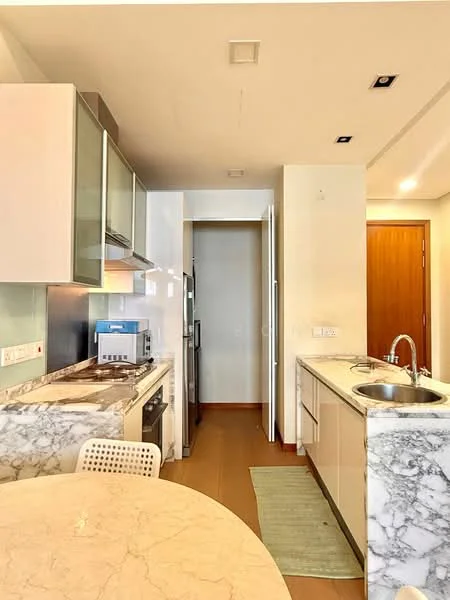 Kitchen features: white cabinetry, marble countertop, stainless-steel sink, chrome pull-down faucet, built-in oven, freestanding range oven, microwave, refrigerator, tile backsplash, breakfast bar, pendant lighting, open shelving, flooring in neutral tone; style: modern.