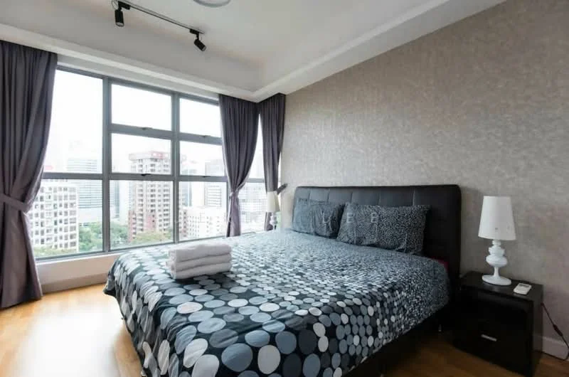 Bedroom features: king-size bed with patterned bedding, upholstered headboard, nightstand with lamp, floor-to-ceiling windows, curtains in dark grey, wooden flooring, decorative wall with textured finish, city view from window; style: modern; view: city.