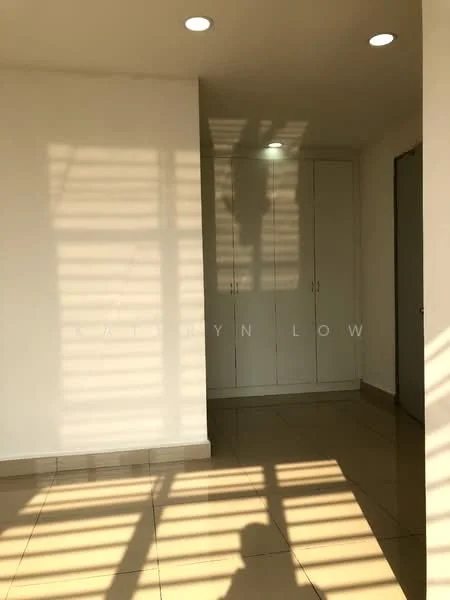 Room features: white painted walls, tile flooring, built-in cabinets, recessed downlights, natural light from windows, shadow patterns on floor, neutral color scheme, smooth ceiling; style: modern.