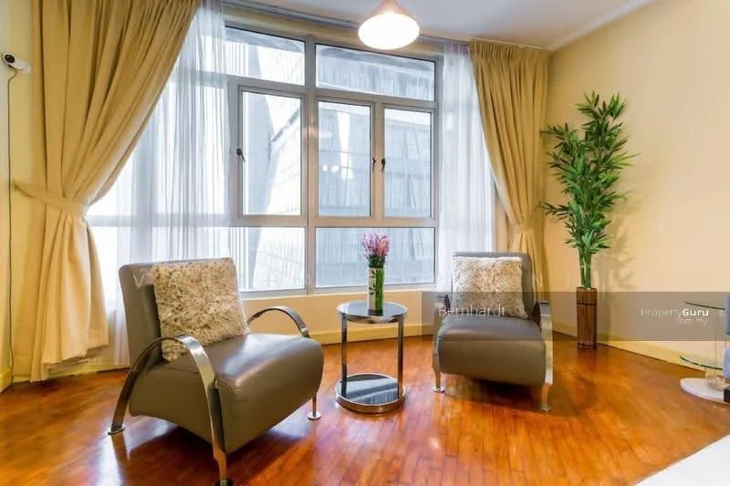 Living features: two grey armchairs, round coffee table, large windows with city view, sheer curtains, wooden flooring, decorative plant, decorative vase with flowers, ceiling light fixture; style: modern; view: city.
