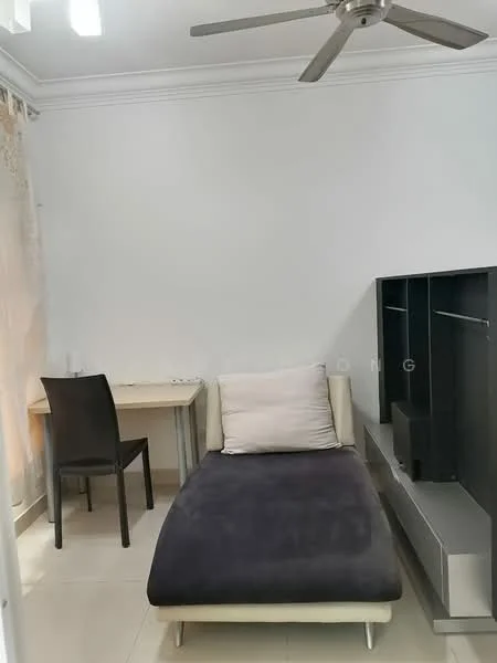 Room features: white painted walls, ceiling fan, light-colored tile flooring, single bed with dark grey upholstery, small desk with chair, built-in storage unit, natural light from window with sheer curtains; style: modern.