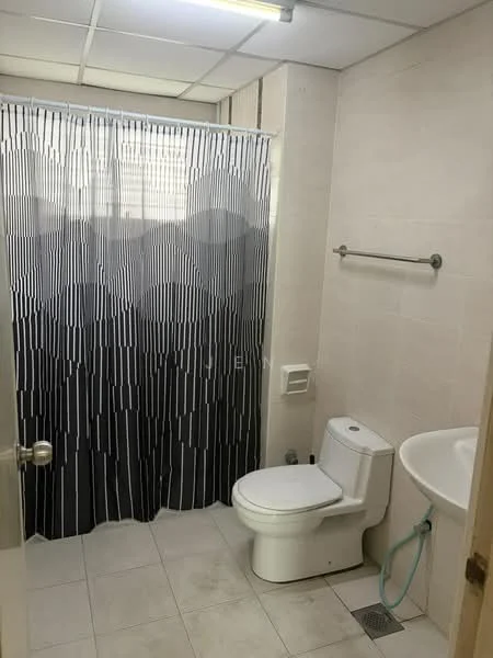 Bathroom features: white ceramic toilet, single-sink vanity with wall-mounted faucet, shower area with black and white striped shower curtain, tile flooring, light-colored wall tiles, mirror above sink, towel bar, drain in floor; style: modern.