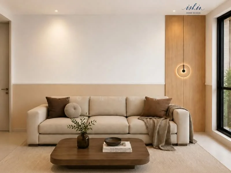 Living features: beige fabric sofa, brown throw blanket, decorative cushion, wooden coffee table, wall-mounted light fixture, wood panel accent wall, neutral painted walls, large window with black frame, area rug, recessed lighting; style: modern.