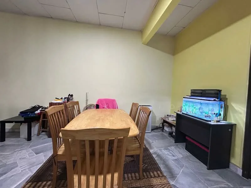 Dining features: wooden dining table, 6 wooden dining chairs, fish tank, black console table, grey stone flooring, yellow painted walls, area rug, air conditioning unit.
