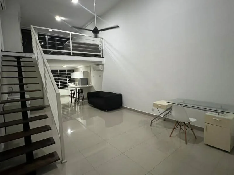 Living features: white painted walls, high ceiling, polished tile flooring, 5-blade ceiling fan with light, large windows with blinds, black fabric sofa, glass-top study desk, white chair, wooden staircase, open layout, recessed downlights; style: modern.