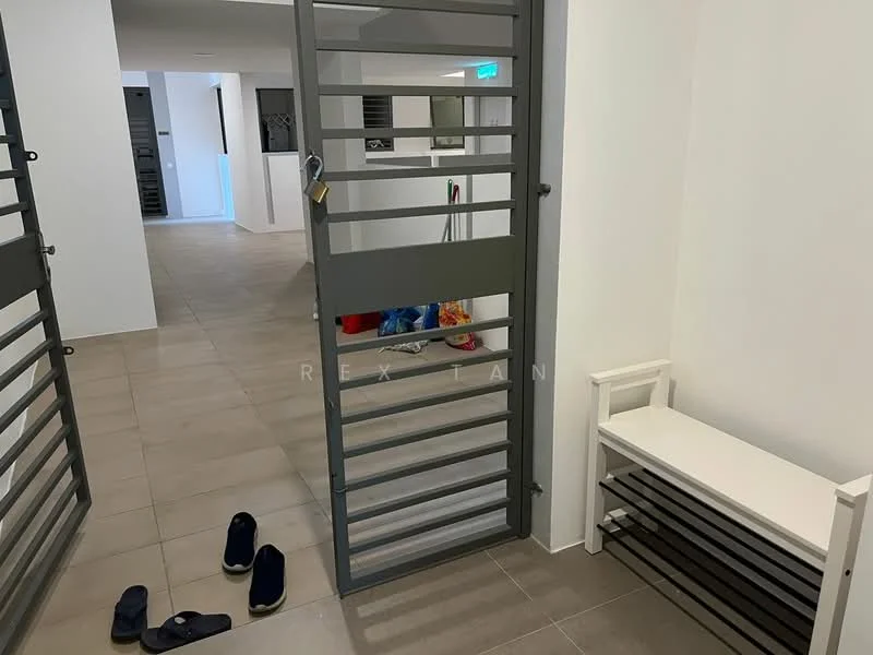 Room features: grey metal security gate, white bench, tile flooring, light-colored walls, slippers on the floor, clean and minimalistic design, visible cleaning supplies, open space layout; style: modern.