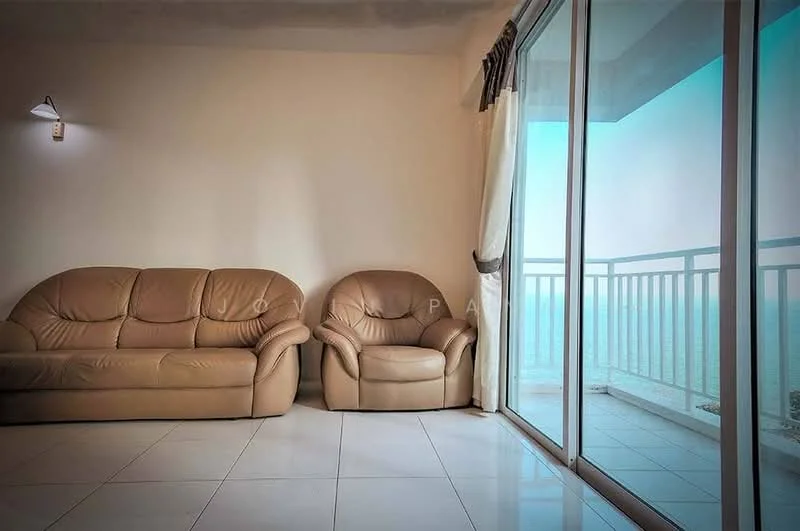 Living features: beige leather 3-seater sofa, beige leather armchair, white painted walls, white tiled flooring, floor-to-ceiling sliding glass door, sheer curtains, recessed lighting, balcony view; style: modern; view: sea.