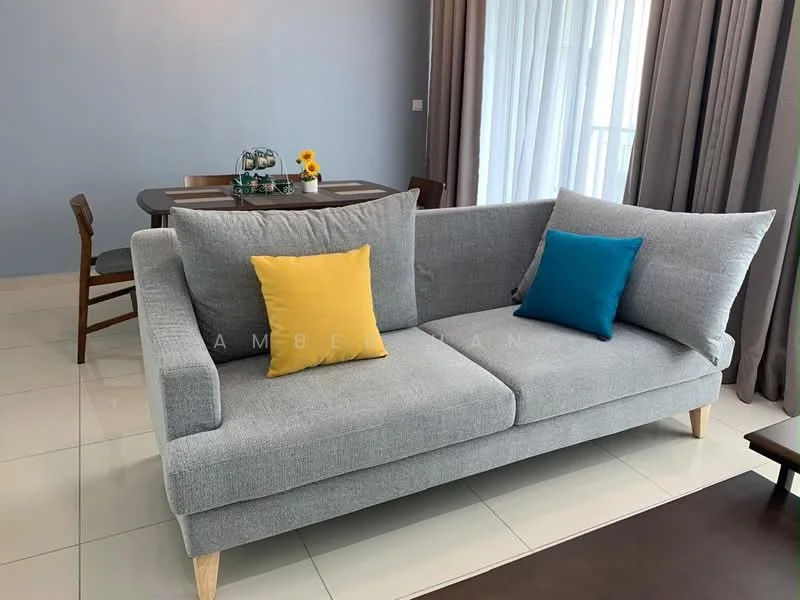 Living features: grey fabric sofa with wooden legs, yellow cushion, blue cushion, light grey walls, white tiled flooring, dining table with chairs in background, floor-to-ceiling windows with sheer curtains, decorative vase with sunflowers on table, wooden coffee table; style: modern.