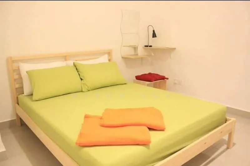 Bedroom features: queen-size bed with wooden frame, green bedding, white pillows, wooden bedside table, red throw pillow, orange towels, wall-mounted lamp, light grey tiled flooring, white painted walls, shelf mounted on wall; style: minimalist.