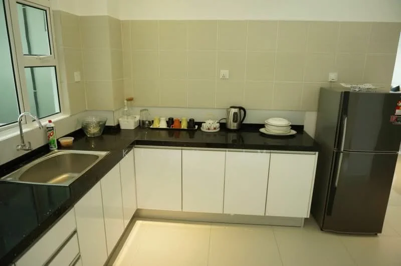 Kitchen features: single-bowl stainless-steel sink, chrome pull-down faucet, black granite countertop, white flat-panel cabinets, stainless-steel fridge, white plates, kettle, glass bowl, colorful mugs, black backsplash, tile flooring, window with grid pattern; style: modern.