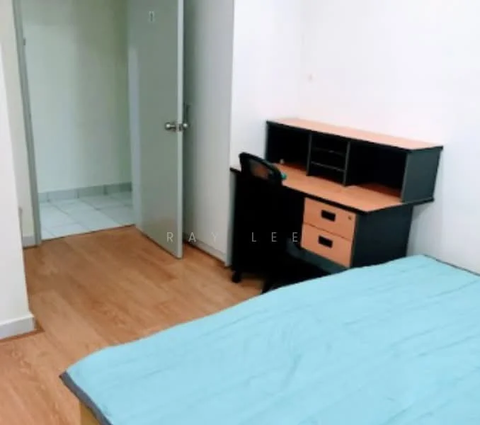 Room features: wooden flooring, light blue bedspread, black desk with drawers, office chair, white walls, door leading to another room, tile flooring visible in adjacent area.